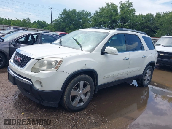 2011 GMC Acadia SLT2 with VIN 1GKKRSED7BJ192685, listed as a IAAI auction lot 42389225 with 329,734 mi miles and . Bid and sale history available at DreamBid. Image 2.