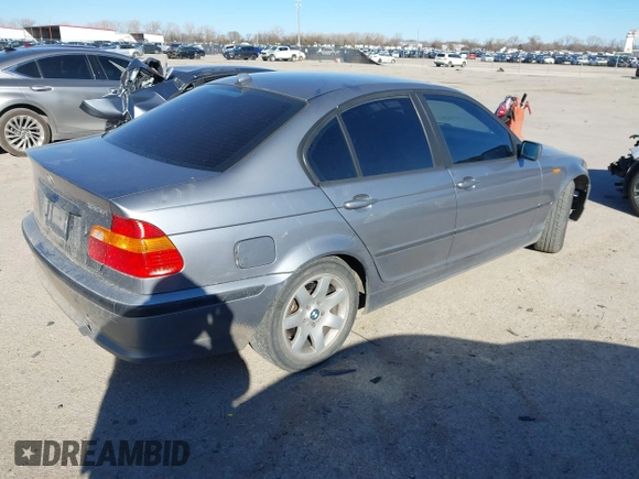 2004 BMW 3 Series 325i with VIN WBAET37414NJ84667, listed as a IAAI auction lot 41723669 with 160,384 mi miles. Bid and sale history available at carsss.com. Image 4.