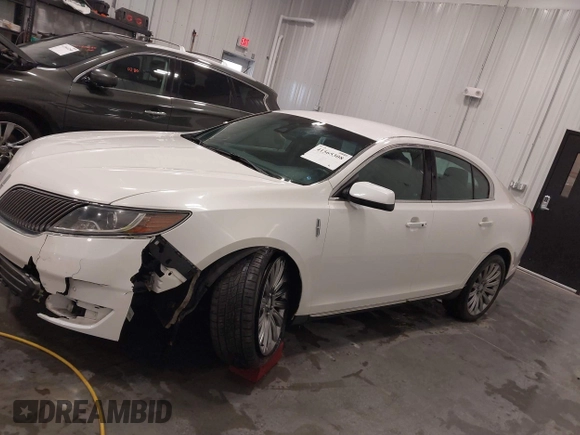 2014 Lincoln MKS with VIN 1LNHL9EK5EG605750, listed as a IAAI auction lot 41565308 with 167,835 mi miles. Bid and sale history available at carsss.com. Image 14.