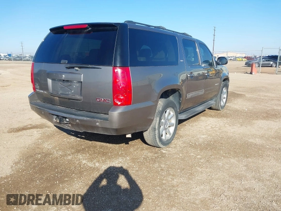 2012 GMC Yukon XL SLT with VIN 1GKS2KE73CR167820, listed as a IAAI auction lot 41462950 with 243,554 mi miles. Bid and sale history available at carsss.com. Image 4.