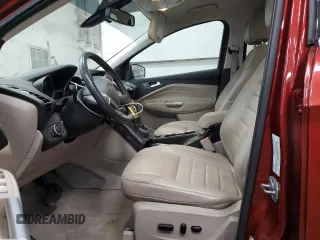 2016 Ford Escape Titanium with VIN 1FMCU9J95GUC57205, listed as a Copart auction lot 71033934 with 90,477 mi miles and Salvage Title. Bid and sale history available at DreamBid. Image 7.