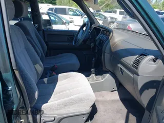 1999 Isuzu Trooper S with VIN JACDJ58X1X7917154, listed as a IAAI auction lot 42632311 with 200,023 mi miles and . Bid and sale history available at DreamBid. Image 5.