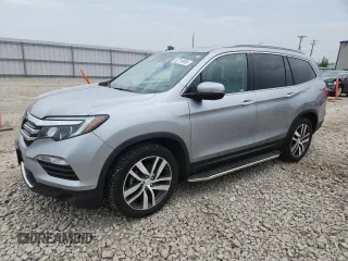 2017 Honda Pilot Touring z VIN 5FNYF6H98HB090731, wystawiony jako Copart lot #60716905 z przebiegiem 105 311 mil mil oraz Czysty tytuł • Clean title. Historia ofert i sprzedaży dostępna na DreamBid. Obrazek 1.