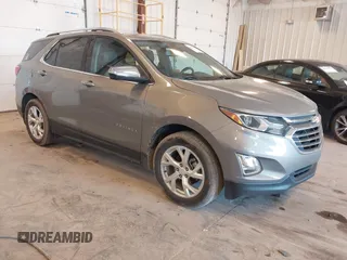 2019 Chevrolet Equinox Premier z VIN 3GNAXNEV3KS522898, wystawiony jako IAAI lot #42240433 z przebiegiem 50 332 mil mil oraz . Historia ofert i sprzedaży dostępna na DreamBid. Obrazek 1.