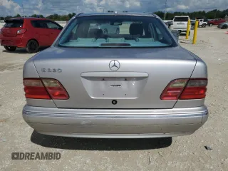 2002 Mercedes-Benz E-Class with VIN WDBJF65J02B495961, listed as a Copart auction lot 73844554 with 99,380 mi miles and Salvage Title. Bid and sale history available at carsss.com. Image 6.