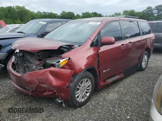 2014 Toyota Sienna XLE with VIN 5TDYK3DC6ES440778, listed as a Copart auction lot 54558895 with 168,714 mi miles and Salvage title. Bid and sale history available at DreamBid. Image 1.