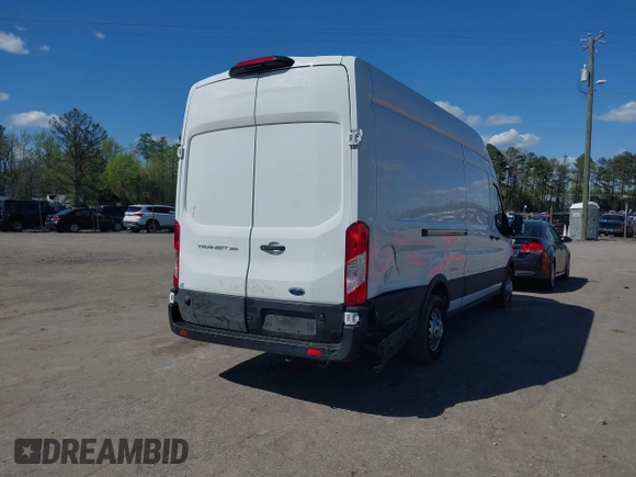2022 Ford Transit Cargo with VIN 1FTBW3X80NKA69156, listed as a IAAI auction lot 42059236 with 100,096 mi miles and . Bid and sale history available at DreamBid. Image 4.