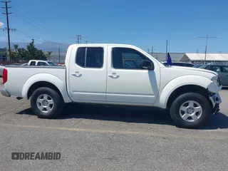 2005 Nissan Frontier LE with VIN 1N6AD07U75C456114, listed as a IAAI auction lot 42222661 with 165,651 mi miles and . Bid and sale history available at DreamBid. Image 13.