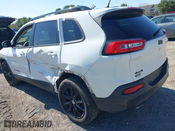 2014 Jeep Cherokee Latitude with VIN 1C4PJMCS9EW309289, listed as a IAAI auction lot 42003252 with 99,360 mi miles and . Bid and sale history available at DreamBid. Image 3.