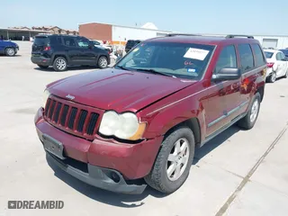 2009 Jeep Grand Cherokee Laredo with VIN 1J8GS48K39C521160, listed as a IAAI auction lot 42039577 with 262,829 mi miles. Bid and sale history available at carsss.com. Image 2.