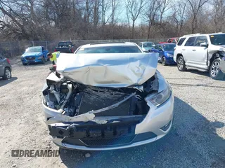 2013 Ford Taurus Limited with VIN 1FAHP2F82DG191141, listed as a IAAI auction lot 41858768 with 172,732 mi miles and . Bid and sale history available at DreamBid. Image 12.