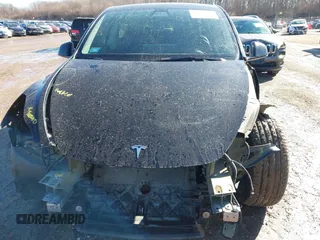 2022 Tesla Model Y Performance with VIN 7SAYGDEFXNF313636, listed as a IAAI auction lot 41660019 with 30,258 mi miles and . Bid and sale history available at DreamBid. Image 10.