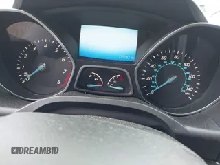 2015 Ford Escape Titanium z VIN 1FMCU9J91FUA85771, wystawiony jako IAAI lot #42306986 z przebiegiem 135 787 mil mil oraz . Historia ofert i sprzedaży dostępna na DreamBid. Obrazek 7.