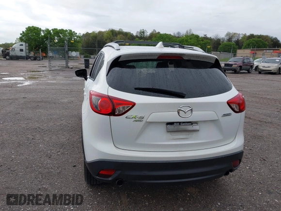 2016 Mazda CX-5 Touring with VIN JM3KE4CY0G0903723, listed as a IAAI auction lot 41966516 with 107,569 mi miles. Bid and sale history available at carsss.com. Image 16.