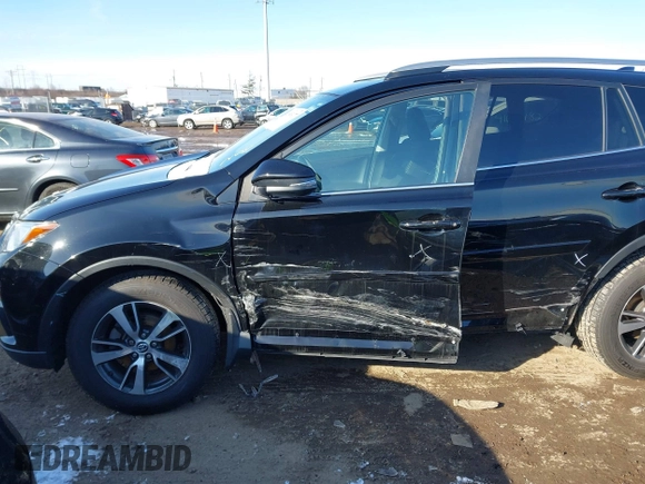 2018 Toyota RAV4 XLE with VIN 2T3RFREV1JW808773, listed as a IAAI auction lot 41595377 with 109,309 mi miles. Bid and sale history available at carsss.com. Image 6.