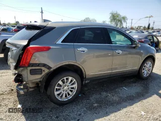 2017 Cadillac XT5 FWD with VIN 1GYKNARS1HZ265368, listed as a Copart auction lot 55365855 with 108,176 mi miles and Salvage title. Bid and sale history available at DreamBid. Image 3.