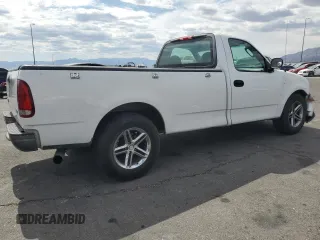 2004 Ford F-150 XL with VIN 2FTRF17294CA59985, listed as a Copart auction lot 55296195 with 220,933 mi miles and Salvage title. Bid and sale history available at DreamBid. Image 3.