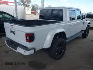 2023 Jeep Gladiator Overland with VIN 1C6HJTFG7PL543870, listed as a IAAI auction lot 42056969 with 28,655 mi miles and . Bid and sale history available at DreamBid. Image 4.