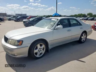1999 Infiniti Q45 z VIN JNKBY31A6XM605037, wystawiony jako Copart lot #66805285 z przebiegiem 150 623 mil mil oraz Czysty tytuł • Clean title. Historia ofert i sprzedaży dostępna na DreamBid. Obrazek 1.