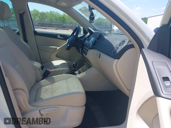 2013 Volkswagen Tiguan SE with VIN WVGAV7AX4DW528410, listed as a IAAI auction lot 42142132 with 148,511 mi miles and . Bid and sale history available at DreamBid. Image 5.