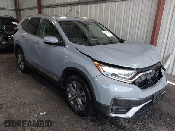 2020 Honda CR-V Touring z VIN 2HKRW2H90LH608435, wystawiony jako IAAI lot #42318256 z przebiegiem 32 602 mil mil oraz . Historia ofert i sprzedaży dostępna na DreamBid. Obrazek 1.