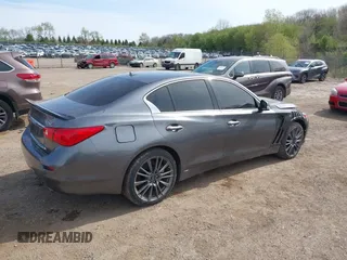 2016 Infiniti Q50 3.0t Red Sport 400 with VIN JN1FV7AR8GM451720, listed as a IAAI auction lot 42163857 with 122,158 mi miles. Bid and sale history available at carsss.com. Image 4.