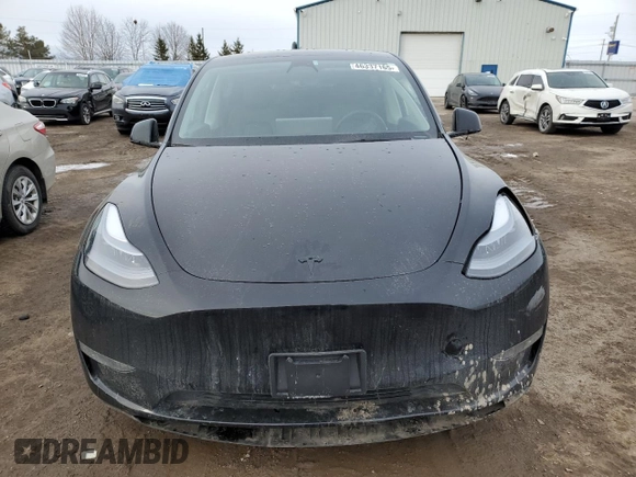 2022 Tesla Model Y Performance z VIN 7SAYGDEF5NF512464, wystawiony jako Copart lot #46337165 z przebiegiem 74 761 mil mil oraz Szkoda całkowita • Salvage title. Historia ofert i sprzedaży dostępna na DreamBid. Obrazek 5.