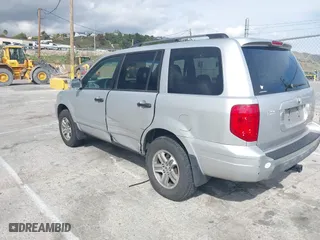 2005 Honda Pilot EX-L with NAVI with VIN 2HKYF18755H552502, listed as a IAAI auction lot 41921122 with 187,904 mi miles. Bid and sale history available at carsss.com. Image 3.