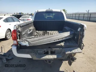 2017 Toyota Tacoma SR5 with VIN 3TMDZ5BN2HM027836, listed as a Copart auction lot 57299415 with 124,255 mi miles and Salvage title. Bid and sale history available at DreamBid. Image 6.