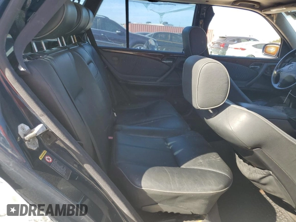 2001 Mercedes-Benz E-Class AWD with VIN WDBJH82J91X053532, listed as a Copart auction lot 82387664 with 116,737 mi miles and Salvage Title. Bid and sale history available at carsss.com. Image 10.