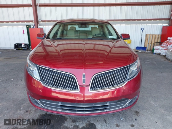 2014 Lincoln MKS z VIN 1LNHL9DK0EG606497, wystawiony jako IAAI lot #42279603 z przebiegiem 129 972 mil mil oraz . Historia ofert i sprzedaży dostępna na DreamBid. Obrazek 12.