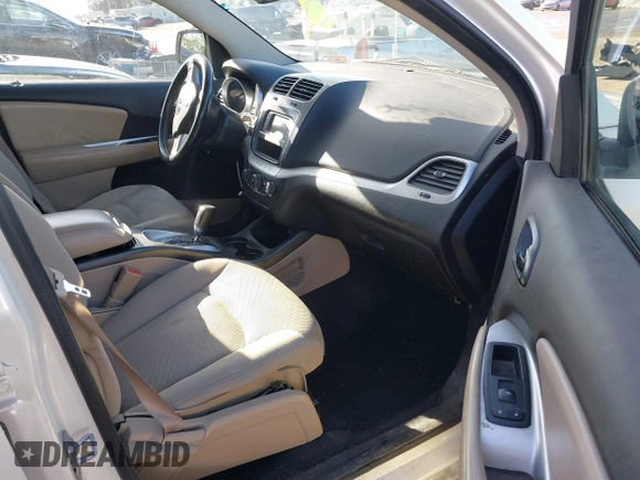 2012 Dodge Journey SXT z VIN 3C4PDCBG7CT374496, wystawiony jako IAAI lot #42317000 z przebiegiem 149 029 mil mil oraz . Historia ofert i sprzedaży dostępna na DreamBid. Obrazek 5.