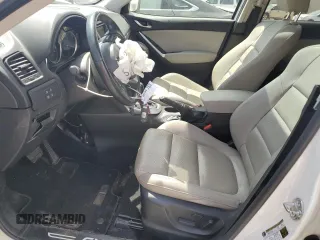 2015 Mazda CX-5 Grand Touring with VIN JM3KE4DY0F0458719, listed as a Copart auction lot 52960365 with 128,372 mi miles and Salvage Title. Bid and sale history available at DreamBid. Image 7.