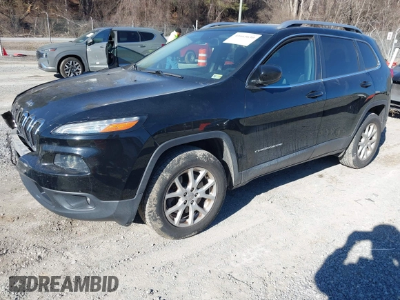 2018 Jeep Cherokee Latitude with VIN 1C4PJMCB1JD589473, listed as a IAAI auction lot 41665630 with 106,371 mi miles and . Bid and sale history available at DreamBid. Image 2.