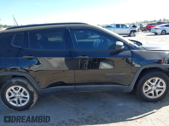 2018 Jeep Compass Sport with VIN 3C4NJCABXJT214907, listed as a IAAI auction lot 41814215 with 96,111 mi miles and . Bid and sale history available at DreamBid. Image 13.