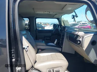 2003 Hummer H2 z VIN 5GRGN23U63H117676, wystawiony jako IAAI lot #41816411 z przebiegiem Nie podano mil oraz . Historia ofert i sprzedaży dostępna na DreamBid. Obrazek 5.