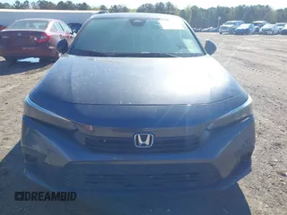 2023 Honda Civic Sport z VIN 2HGFE2F56PH503825, wystawiony jako IAAI lot #41854174 z przebiegiem 54 772 mil mil oraz . Historia ofert i sprzedaży dostępna na DreamBid. Obrazek 12.