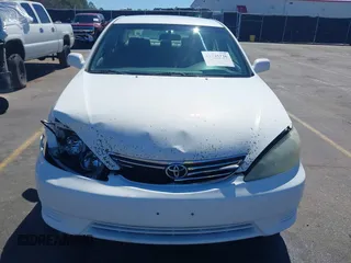 2006 Toyota Camry STD with VIN 4T1BE32KX6U734944, listed as a IAAI auction lot 41745226 with 243,967 mi miles. Bid and sale history available at carsss.com. Image 12.
