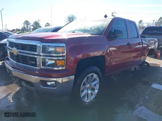 2014 Chevrolet Silverado 1500 LT with VIN 1GCVKREC7EZ203414, listed as a IAAI auction lot 41447007 with 129,537 mi miles. Bid and sale history available at carsss.com. Image 17.