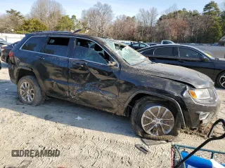 2015 Jeep Grand Cherokee Altitude with VIN 1C4RJEAG4FC653953, listed as a Copart auction lot 48738185 with 117,797 mi miles and Salvage Title. Bid and sale history available at carsss.com. Image 4.