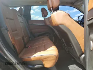 2015 Jeep Grand Cherokee Summit with VIN 1C4RJFJG6FC828922, listed as a Copart auction lot 54878415 with 125,781 mi miles and Salvage title. Bid and sale history available at DreamBid. Image 10.