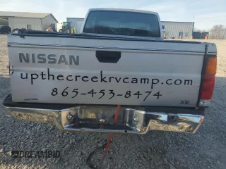 1986 Nissan Hardbody E z VIN 1N6ND16Y0GC394344, wystawiony jako Copart lot #86650524 z przebiegiem 122 949 mil mil oraz Tytuł czysty. Historia ofert i sprzedaży dostępna na DreamBid. Obrazek 6.