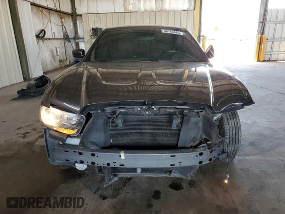 2013 Dodge Charger SE z VIN 2C3CDXBG4DH735185, wystawiony jako Copart lot #56763685 z przebiegiem 119 640 mil mil oraz Szkody całkowita. Historia ofert i sprzedaży dostępna na DreamBid. Obrazek 5.