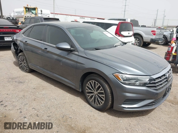 2021 Volkswagen Jetta S z VIN 3VWC57BU0MM032910, wystawiony jako IAAI lot #41836545 z przebiegiem 64 042 mil mil oraz . Historia ofert i sprzedaży dostępna na DreamBid. Obrazek 1.