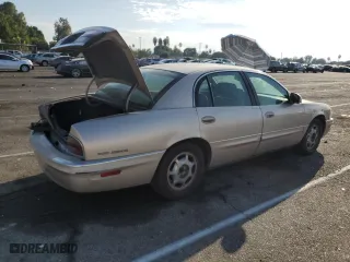 1999 Buick Park Avenue with VIN 1G4CW52K6X4653731, listed as a Copart auction lot 72736444 with 128,471 mi miles and Salvage Title. Bid and sale history available at carsss.com. Image 3.
