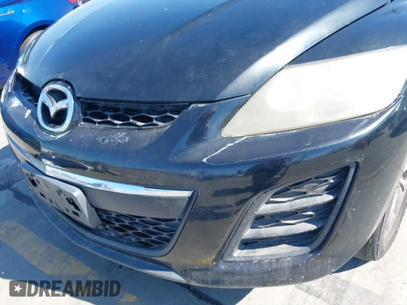 2010 Mazda CX-7 Touring with VIN JM3ER4WL5A0307130, listed as a IAAI auction lot 41659798 with 142,342 mi miles. Bid and sale history available at carsss.com. Image 6.