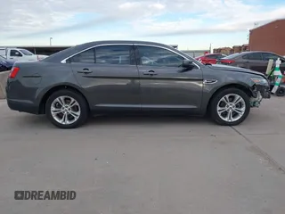 2017 Ford Taurus SEL z VIN 1FAHP2E80HG129843, wystawiony jako IAAI lot #41252910 z przebiegiem 111 923 mil mil oraz . Historia ofert i sprzedaży dostępna na DreamBid. Obrazek 13.