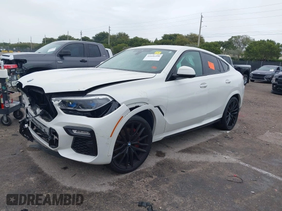 2021 BMW X6 xDrive40i z VIN 5UXCY6C00M9F88215, wystawiony jako IAAI lot #41646498 z przebiegiem 43 587 mil mil oraz . Historia ofert i sprzedaży dostępna na DreamBid. Obrazek 17.