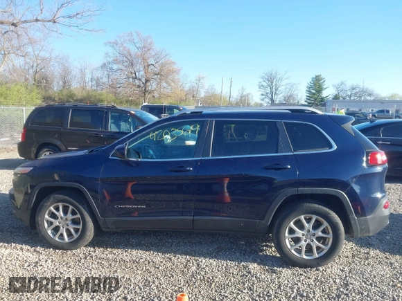 2015 Jeep Cherokee Latitude with VIN 1C4PJMCB1FW709560, listed as a IAAI auction lot 42035619 with 162,354 mi miles. Bid and sale history available at carsss.com. Image 14.