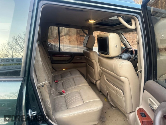2000 Lexus LX 470 z VIN JT6HT00W5Y0105585, wystawiony jako Copart lot #49099395 z przebiegiem 153 695 mil mil oraz Czysty tytuł • Clean title. Historia ofert i sprzedaży dostępna na DreamBid. Obrazek 6.